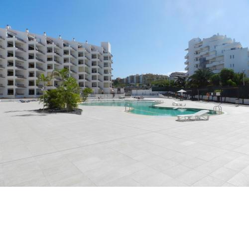 Sunny Summerland Los Cristianos, ap with city and ocean view