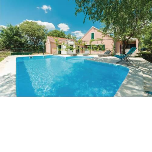 Three-Bedroom Holiday Home in Trbounje
