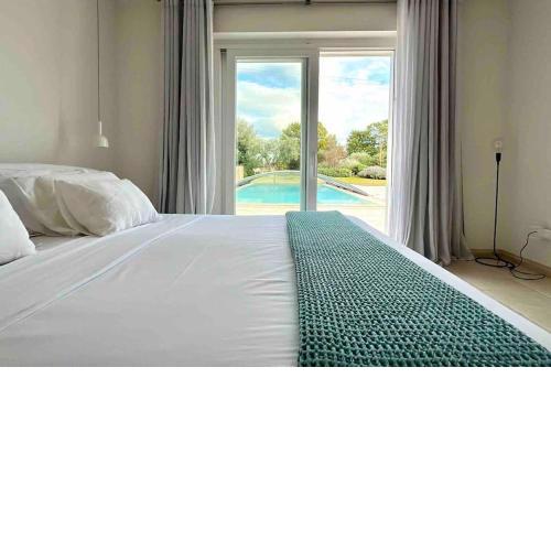 Three suites villa with pool and trulli .