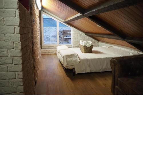 Tiny and cute apartment in the roof touching border
