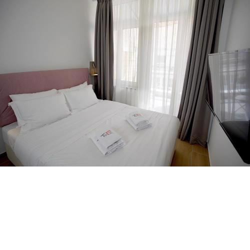 TiP - ToP Suites