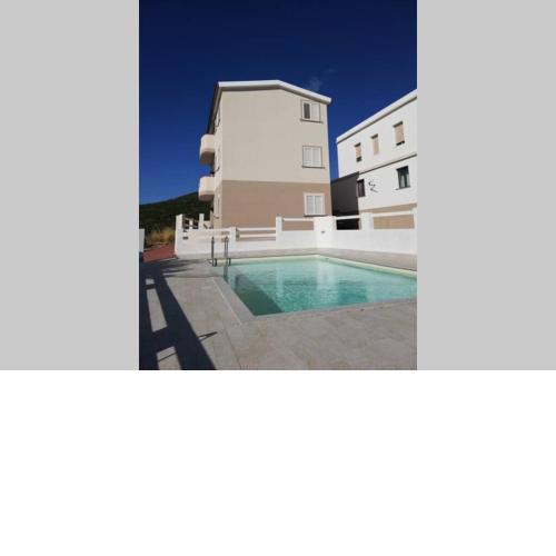 Trilocale vista mare con piscina a Badesi