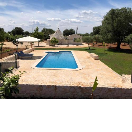 TRULLO PARCOMONSIGNORE CON PISCINA PRIVATA