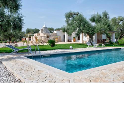 Trullo Sunrise - trullo con piscina Privata
