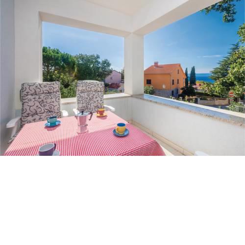 Two-Bedroom Apartment Njivice with Sea View 07