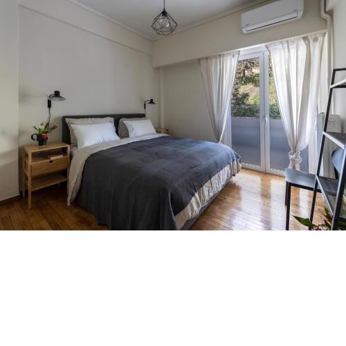 Urban Elegance 2BR with Hill & Lycabettus Views