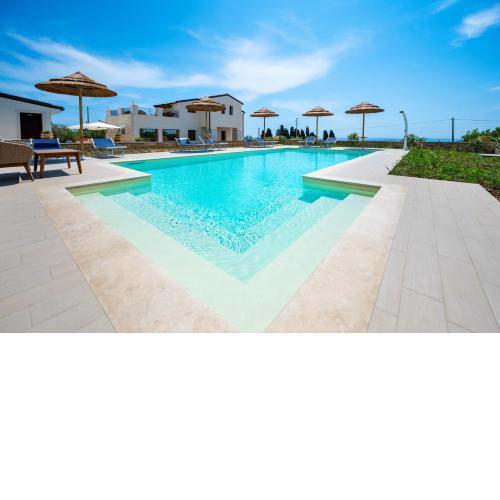 Villa CarmIano luxury bedrooms in Avola in the province of Syracuse with spa and swimming pool and wonderful seaview