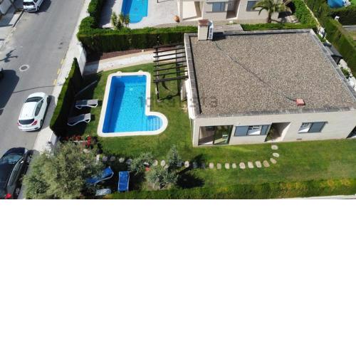 Villa con jardín tropical