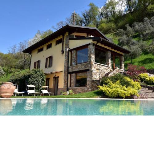 Villa in Pisogne with pool garden and lake view