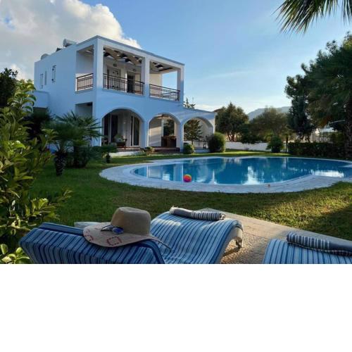Villa Sofia with garden, pool and lounge areas