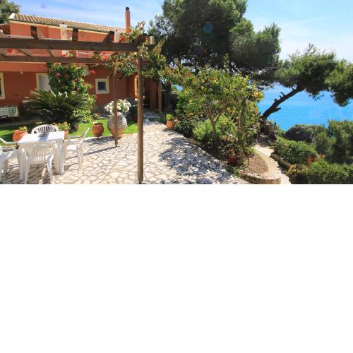 Villa Takis on Pelekas beach Apartment A with private garden and sea view