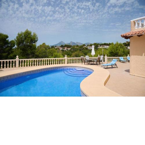 Villa with pool on golf course