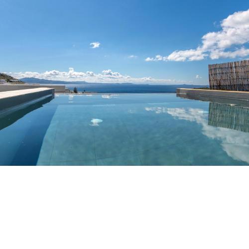 Villa with View of Agios Ioannis and Pool with Jacuzzi
