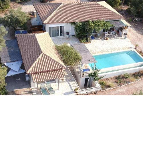 Villa zorba nestled in the countryside facing the sea