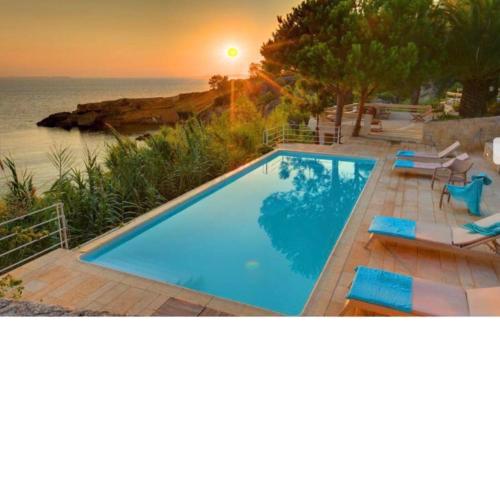 VILLAPARADISO Beach front Villa Makris Gialos
