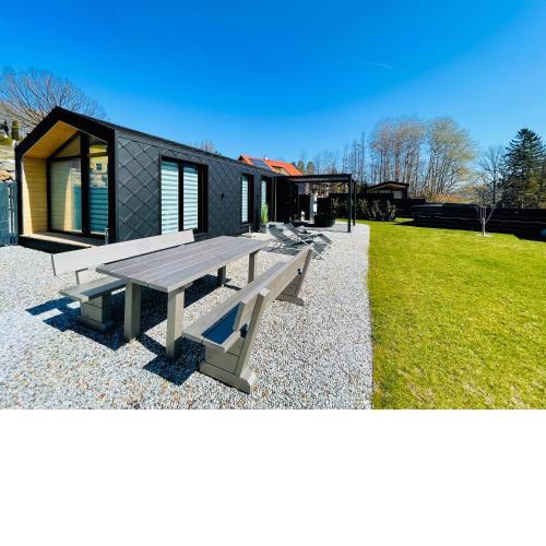 Voralpen Lodge - Ferienhaus mit Wellnessbereich