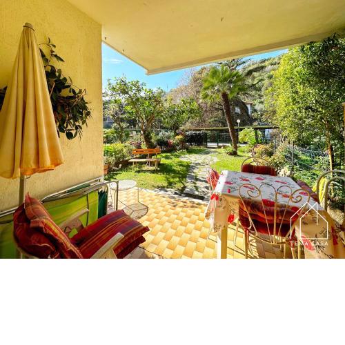 WH - Bilocale olivi con giardino e posto auto