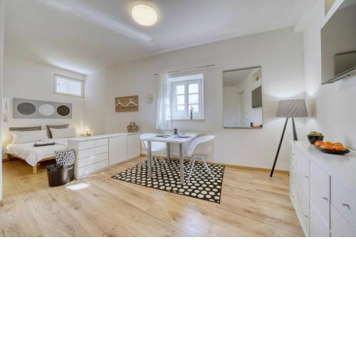 Zentral gelegenes Apartment mit Garage und Garten