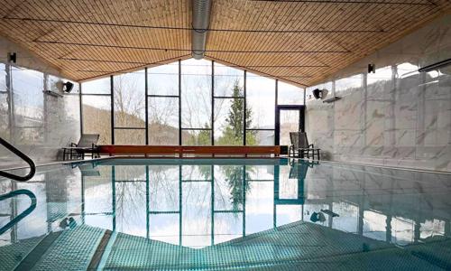 Krkonoše: Wellness Hotel Astra *** Superior s polpenziou, vnútorným bazénom a saunami + lístky na lanovky